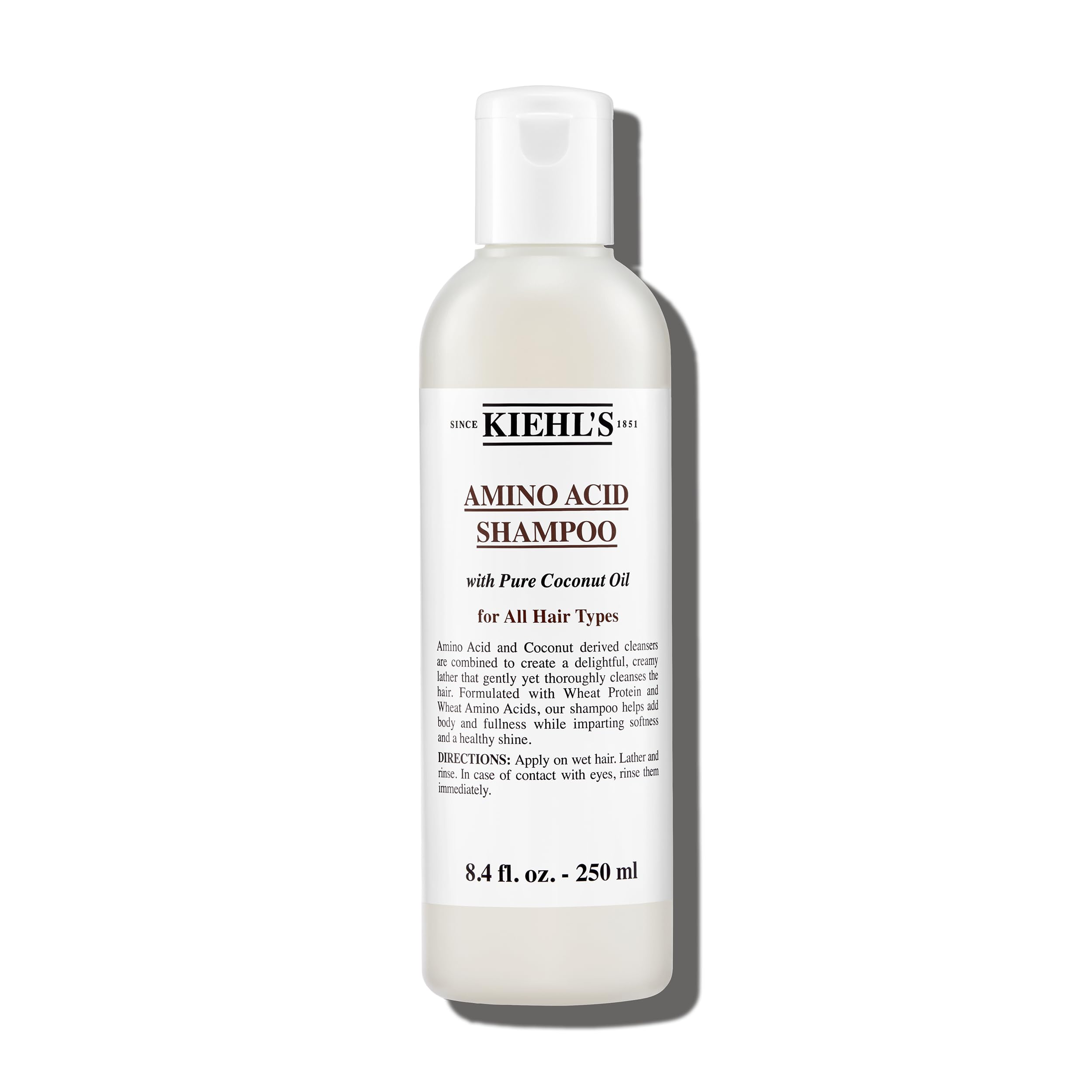 Botella de Kiehl's Amino Acid Shampoo limpia suave y revitaliza el cabello