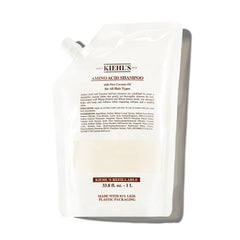 Kiehl's Aminoacidos Shampoo en botella para limpieza suave diaria.