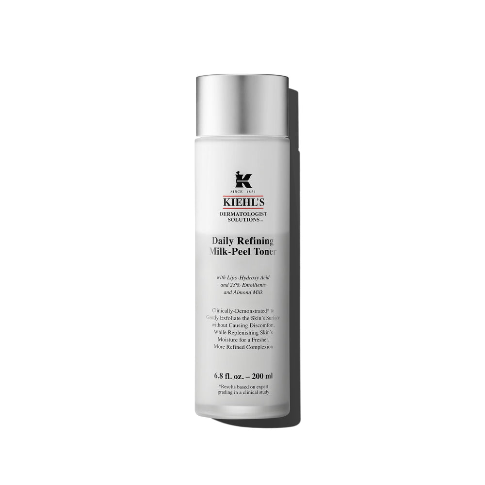 Kiehl's Tonico Leche Exfoliante en botella, mejora textura y luminosidad de la piel.