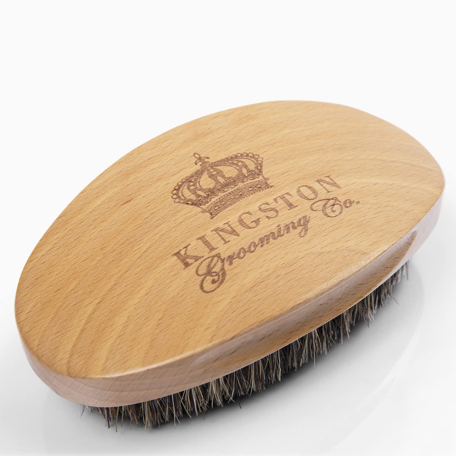 Kingston Grooming Co. Manija ergonómica para cepillado cómodo y controlado.