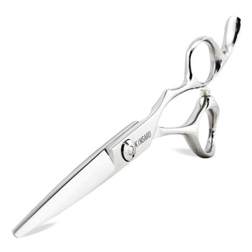 Tijeras KINSARO Barbero profesional con cuchillas convexas para cortes precisos.