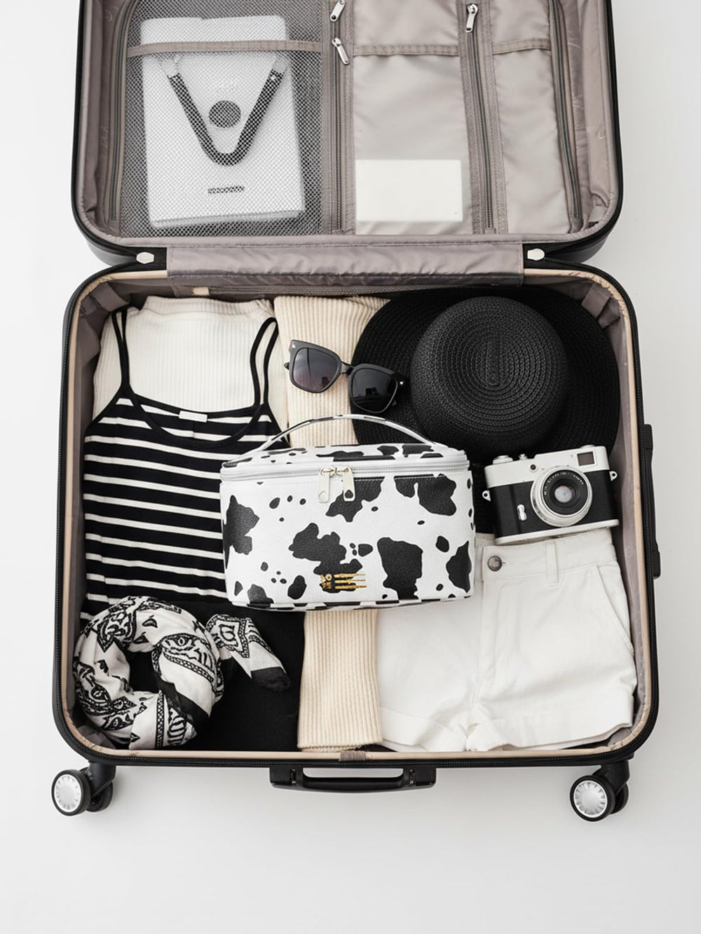 KITENROM bolso con impresión vaca, estilo único y protección para cosméticos.