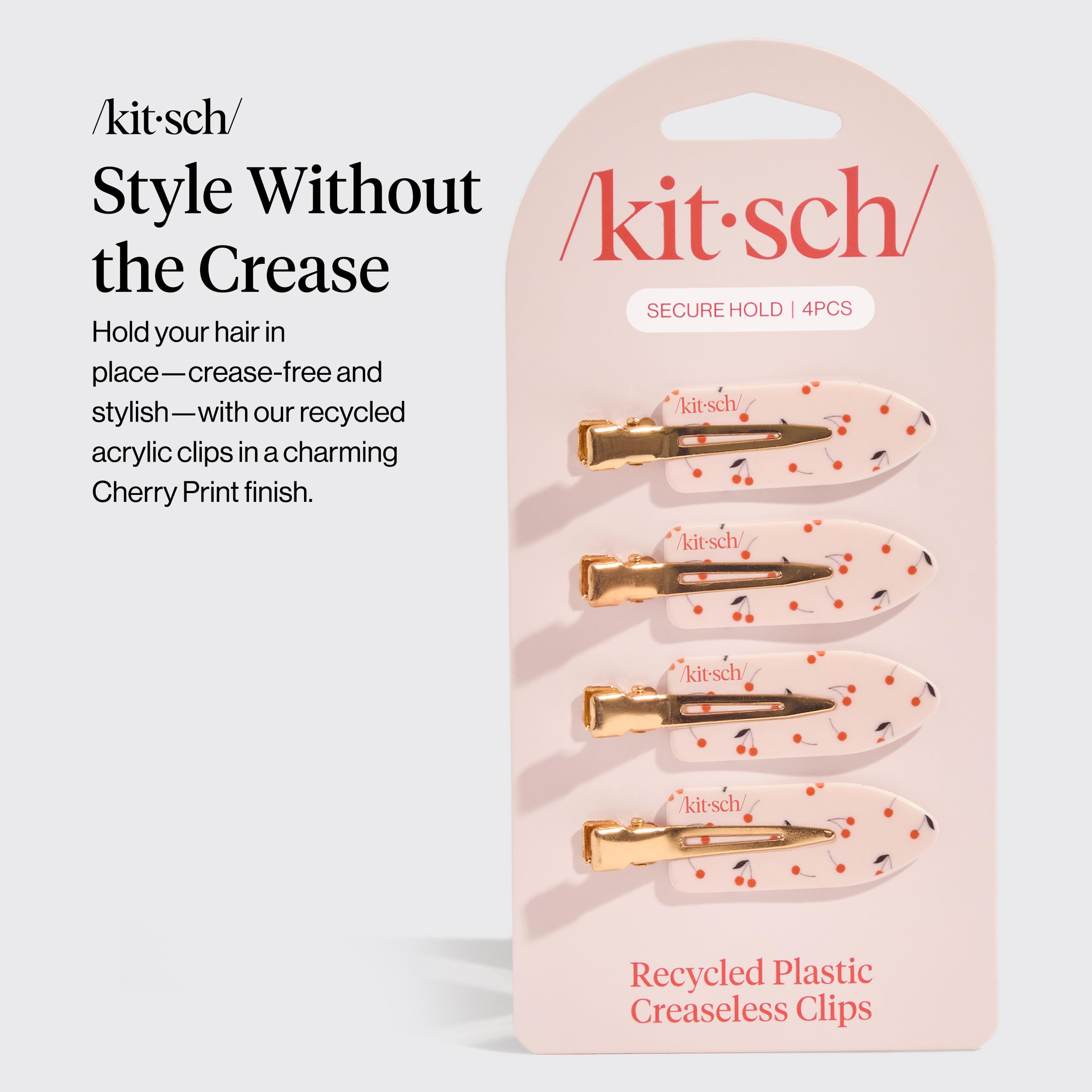 Kitsch clip de acrílico reciclado con diseño cereza para un look ordenado.