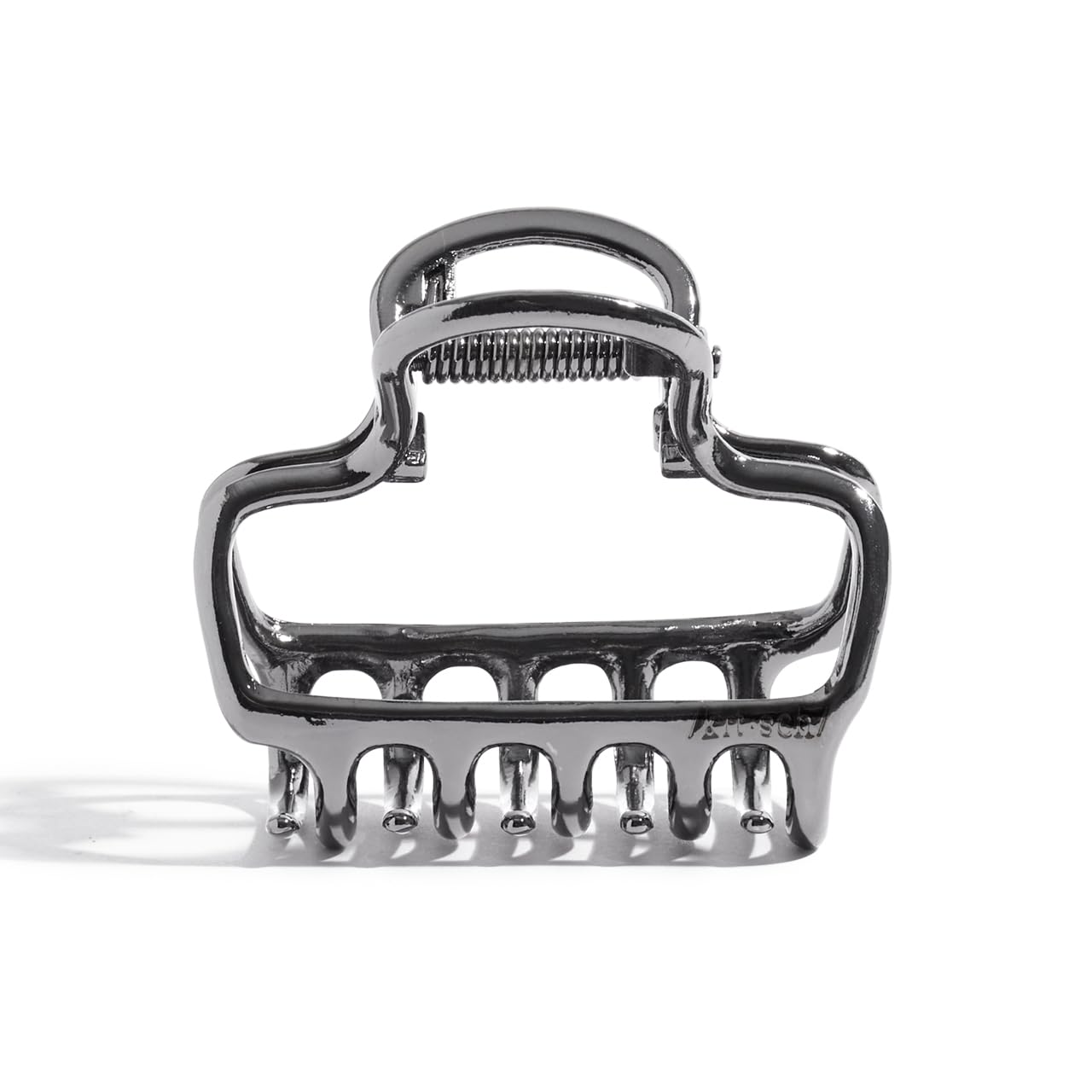 Kitsch clip de pelo hematita, primer plano, agarre firme para mechones.