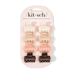 Kitsch pinzas de pelo mini en rosewood, mostradas en mano.