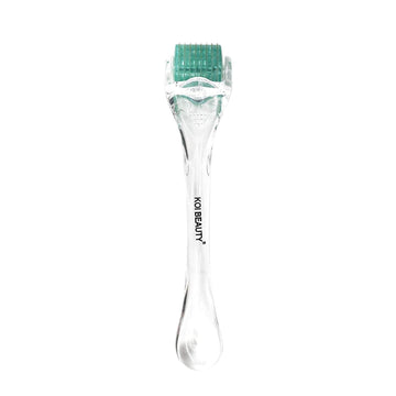 Koi Beauty derma roller close-up shows 200 titanium pins for durability.