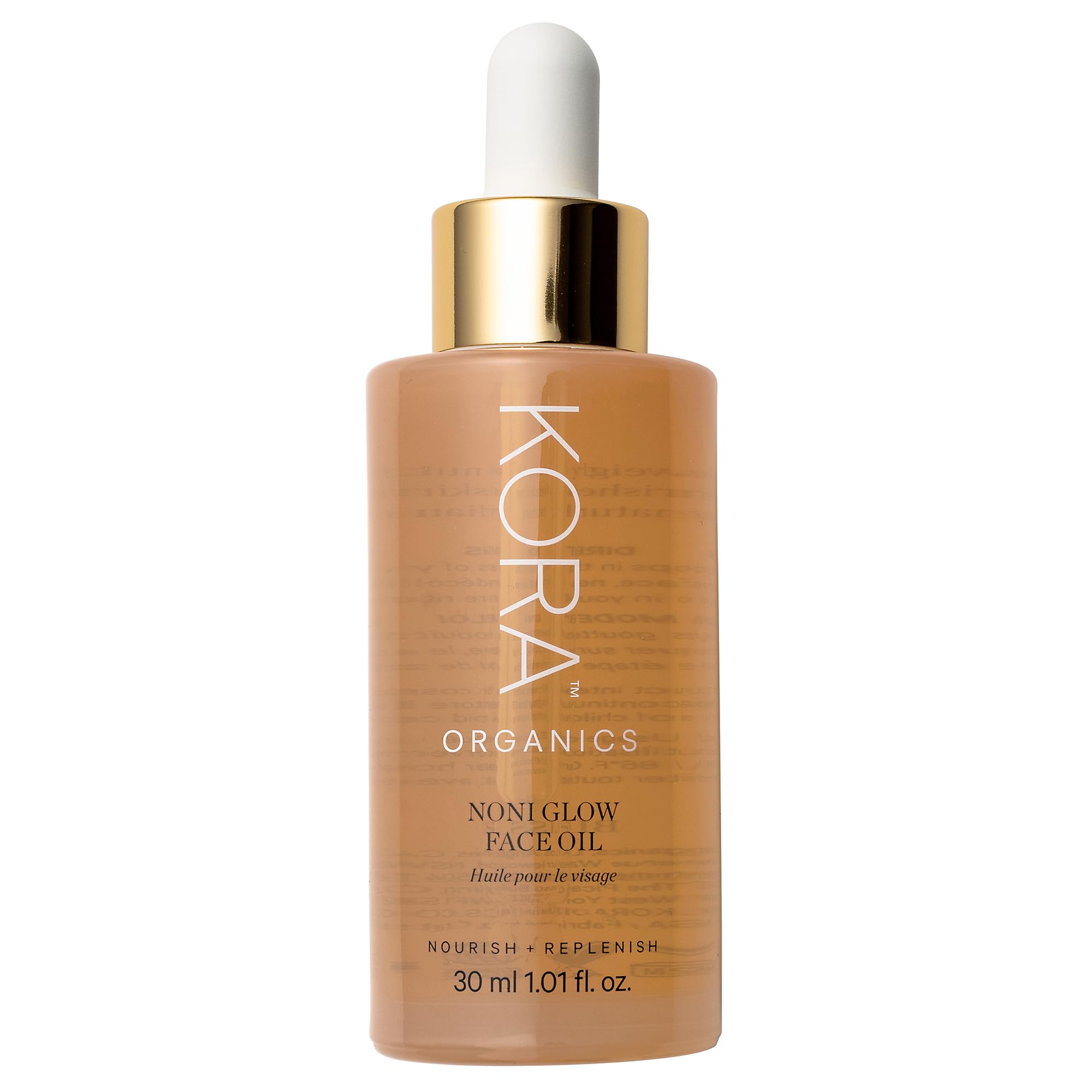 KORA Organics Noni Glow: botella de aceite facial para hidratación suave y brillo natural.