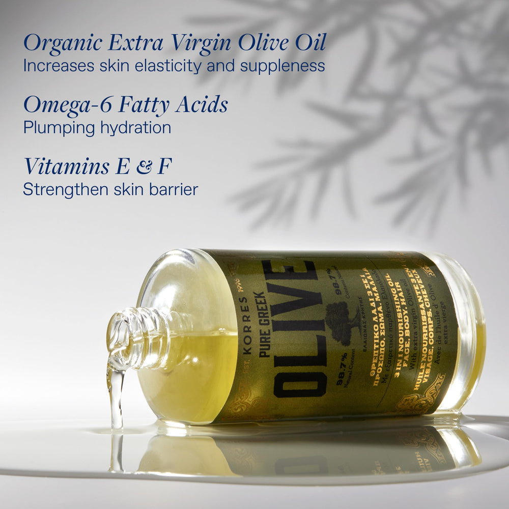 Application visage avec l'huile d'olive Korres—texture légère et absorption rapide.
