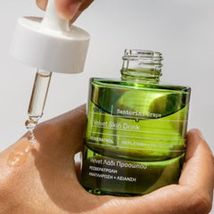 KORRES Santorini Raisin Bouteille – sérum visage avec hydratation durable.