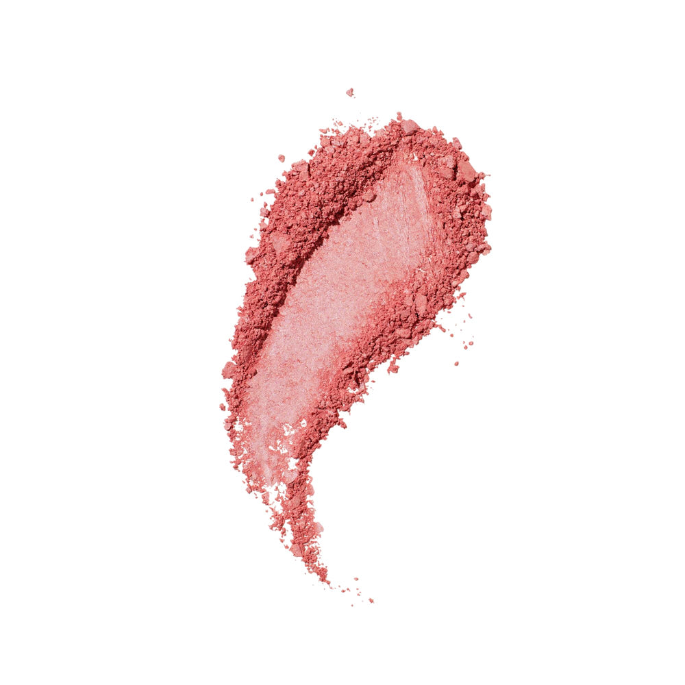 Kosas Blush is Life color vibrante para realzar el look.