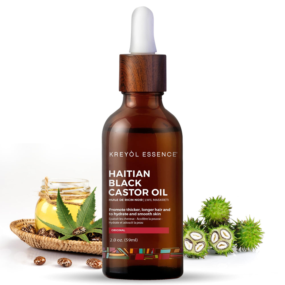 Kreyol Essence aceite negro haitiano en botella de vidrio, hidratación profunda para cabello.