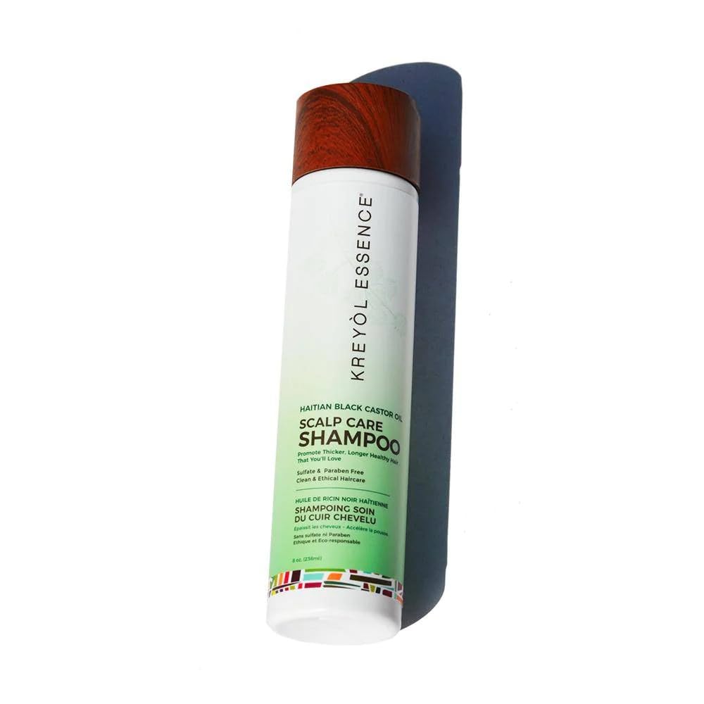 Kreyol Essence Let it Glow Shampoo pour demonstrates cleansing action