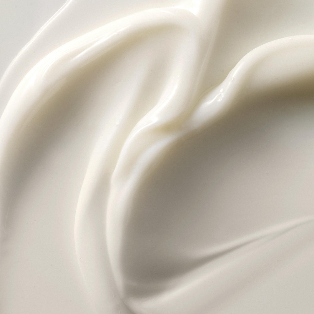 Hidratación con aceite de ricino de Kristin Ess para cabello suave.