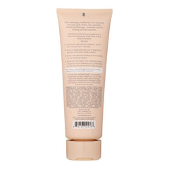 Aplicación fácil de Kristin Ess Frizz Management para cabello rizado con humedad controlada.