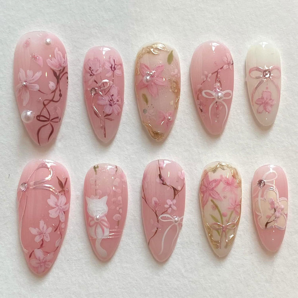 KRTBKR uñas press on media almendra rosa con flor para un look rápido