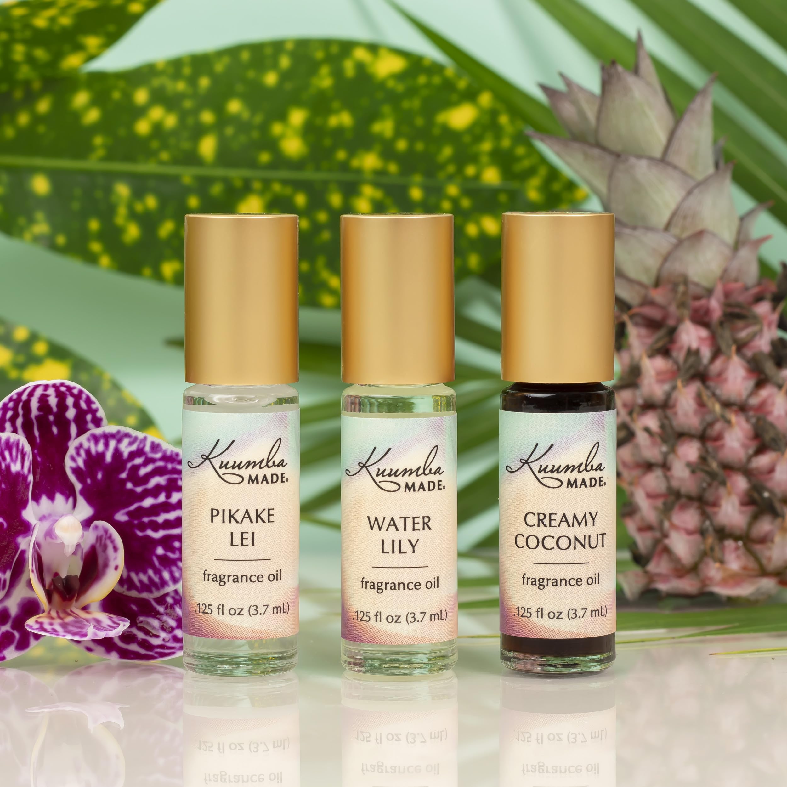 Kuumba Made Frasco compacto coco cremoso facilita viaje y uso discreto.