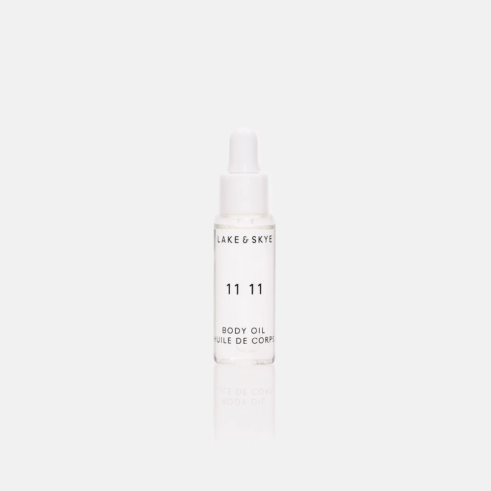 Lake & Skye 11 11 Body Oil Mini bottle showing clean skin musk scent