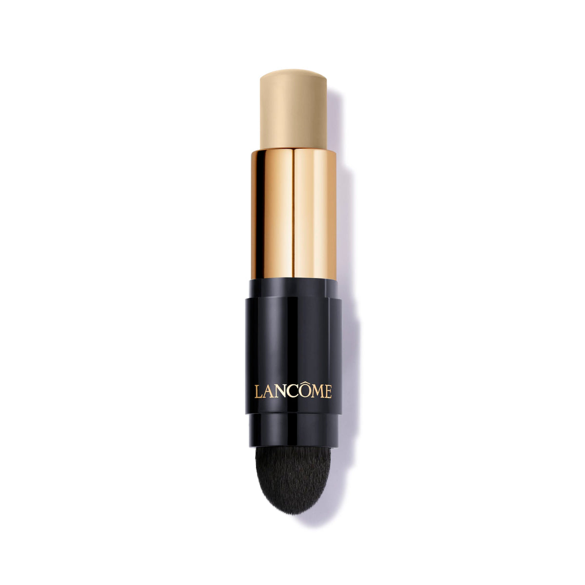 Lancôme Teint Idôle Ultra Wear Stick con brocha Kabuki integrada para aplicación rápida.