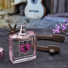 Lane Frost Legendary para Ella, corazón vainilla orquídea y musk suave.