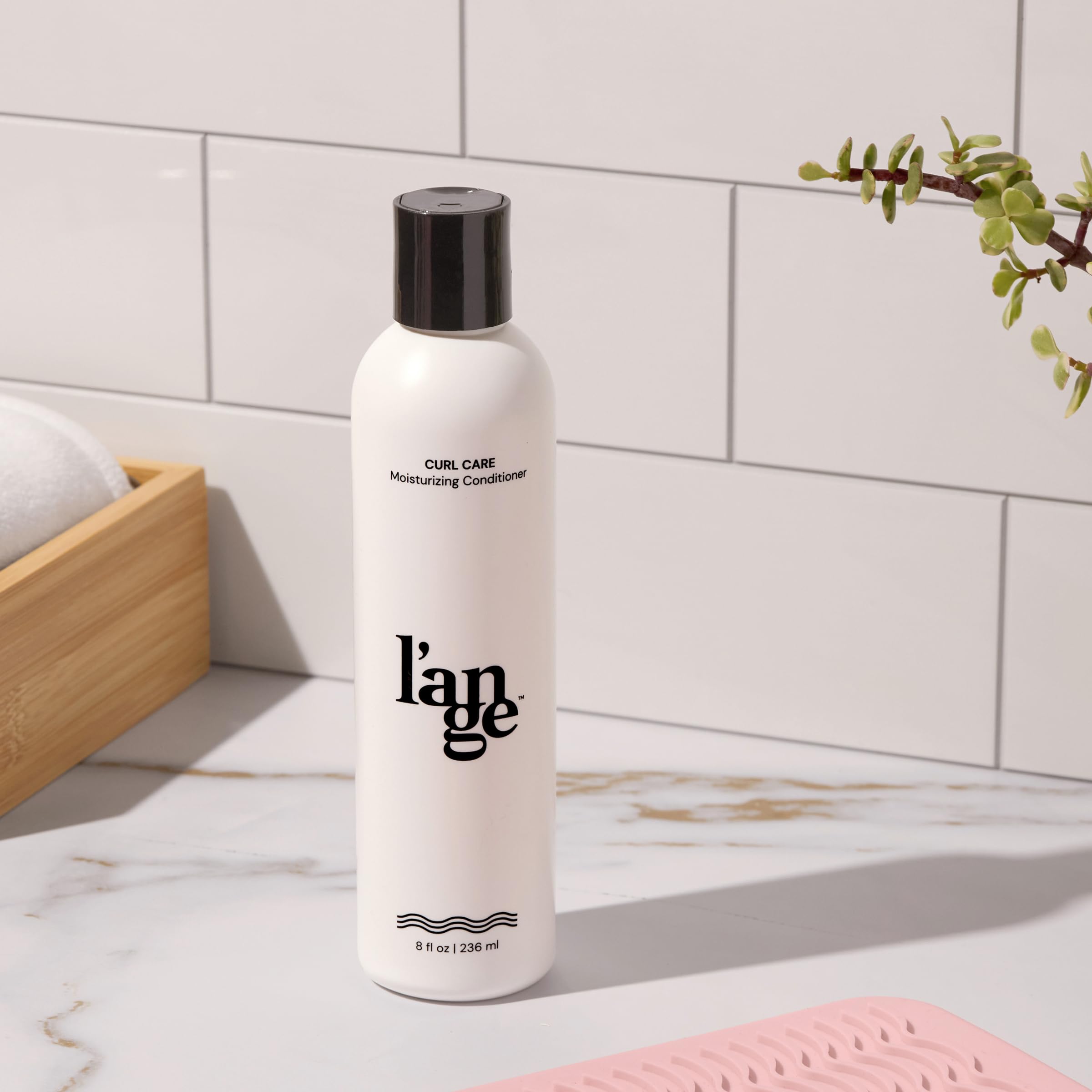 L'ANGE HAIR envase-diseño-sencillo, presentación práctica para ducha