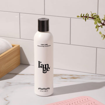 L'ANGE HAIR envase-diseño-sencillo, presentación práctica para ducha