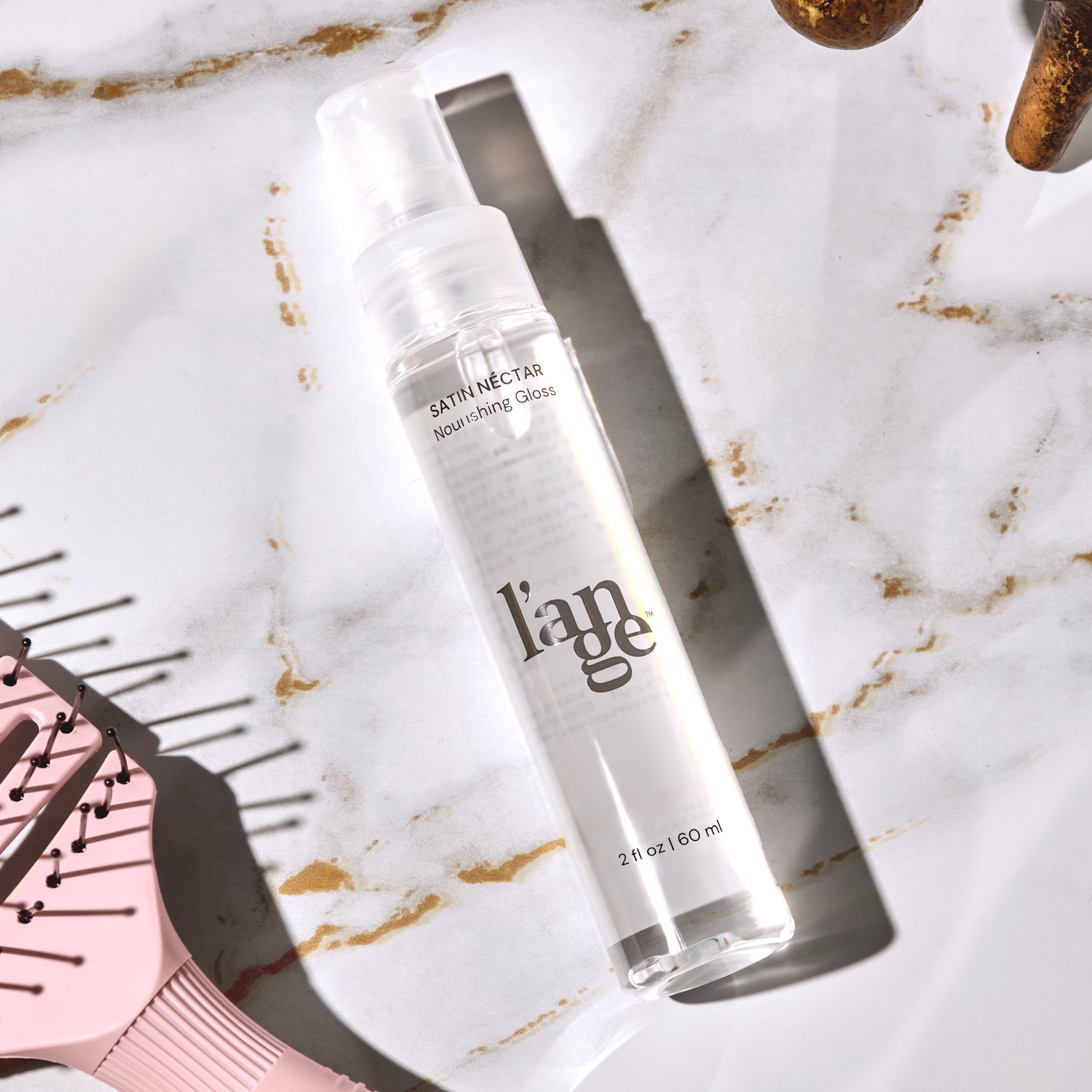 Finished look with Satin Néctar Nourishing Gloss gives a smooth, shiny hair finish.