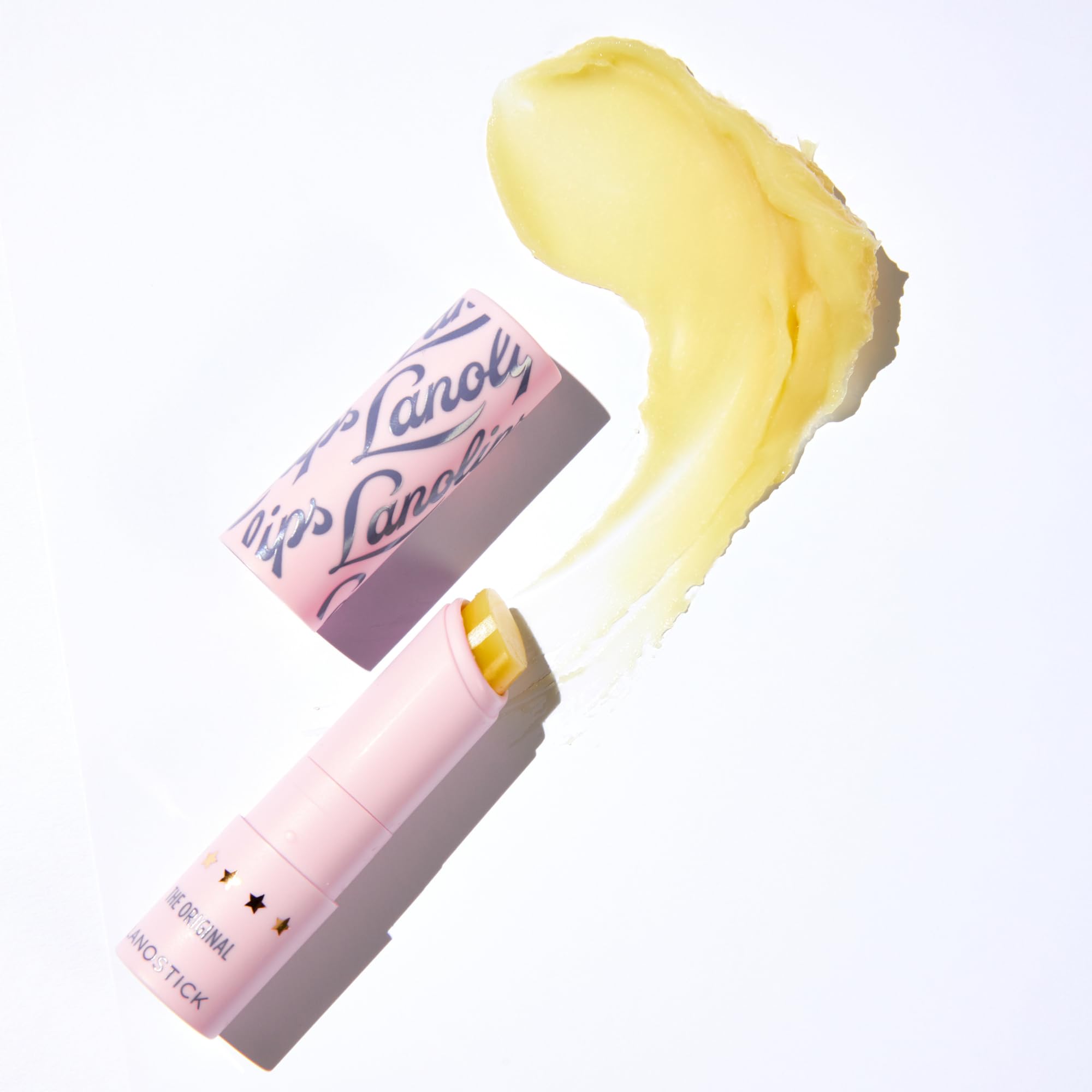 Lanolips Lanostick textura suave que sella la humedad de los labios.