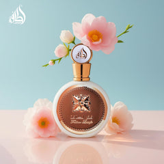 Lattafa Fakhar, corazón de rosas y jazmín, aroma floral envolvente.