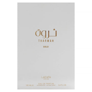 Lattafa Tharwah Gold, etiqueta frasco, revela notas florales y dulces para diario.