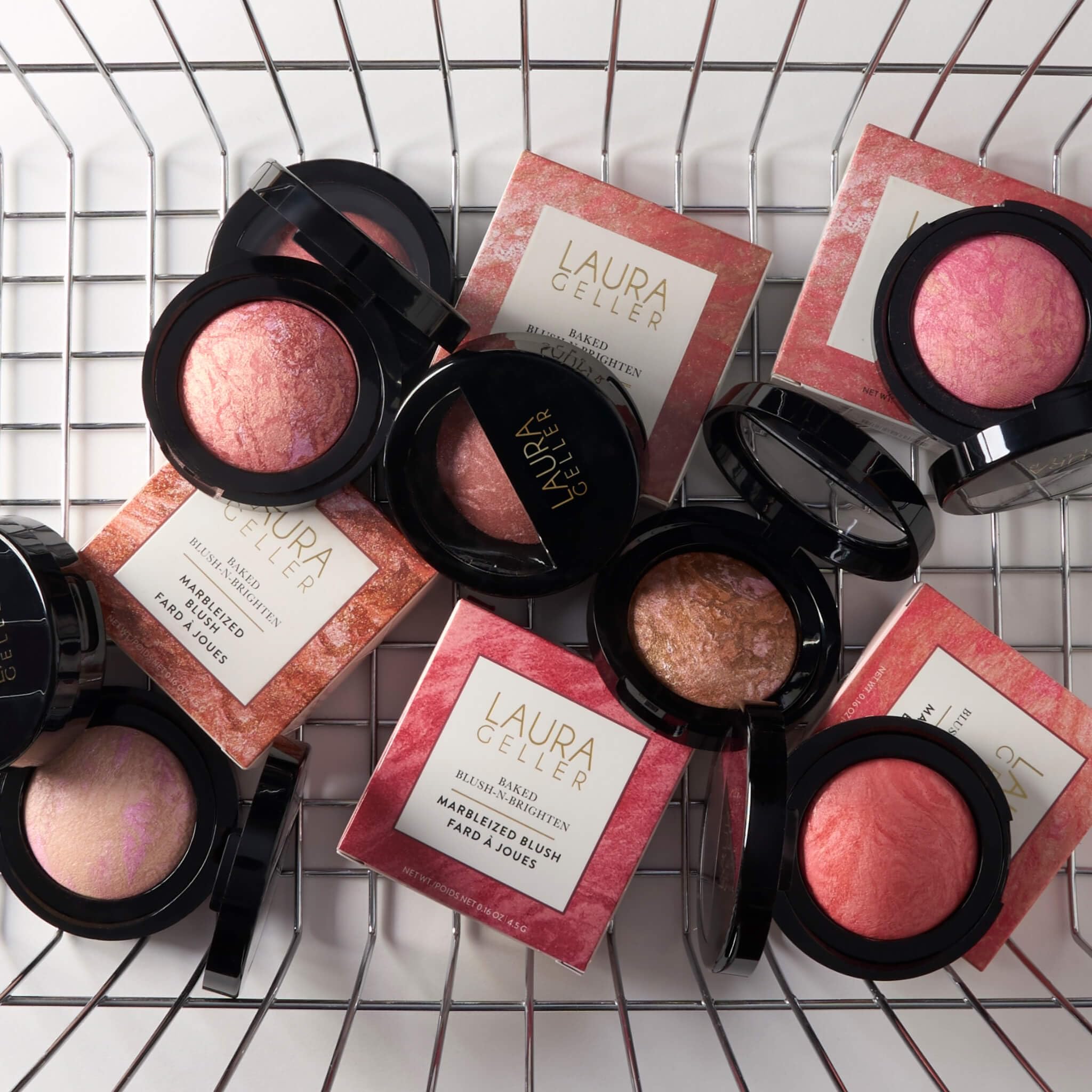 Laura Geller New York aplicación con brocha realza pómulos con color rosado