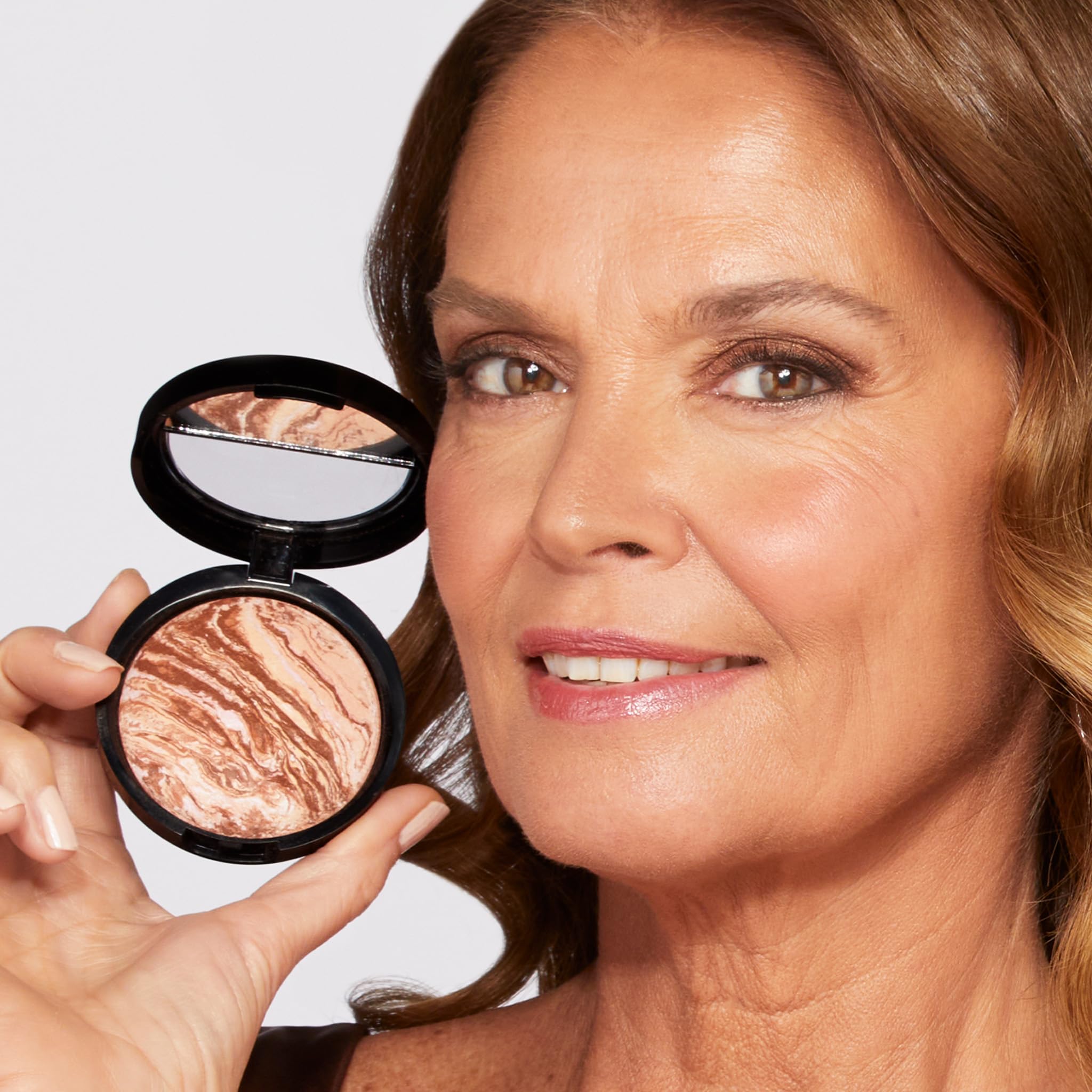 Laura Geller New York bronceador polvo multipropósito rostro