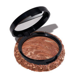 Polvo bronceador Laura Geller New York, tono profundo, acabado natural.