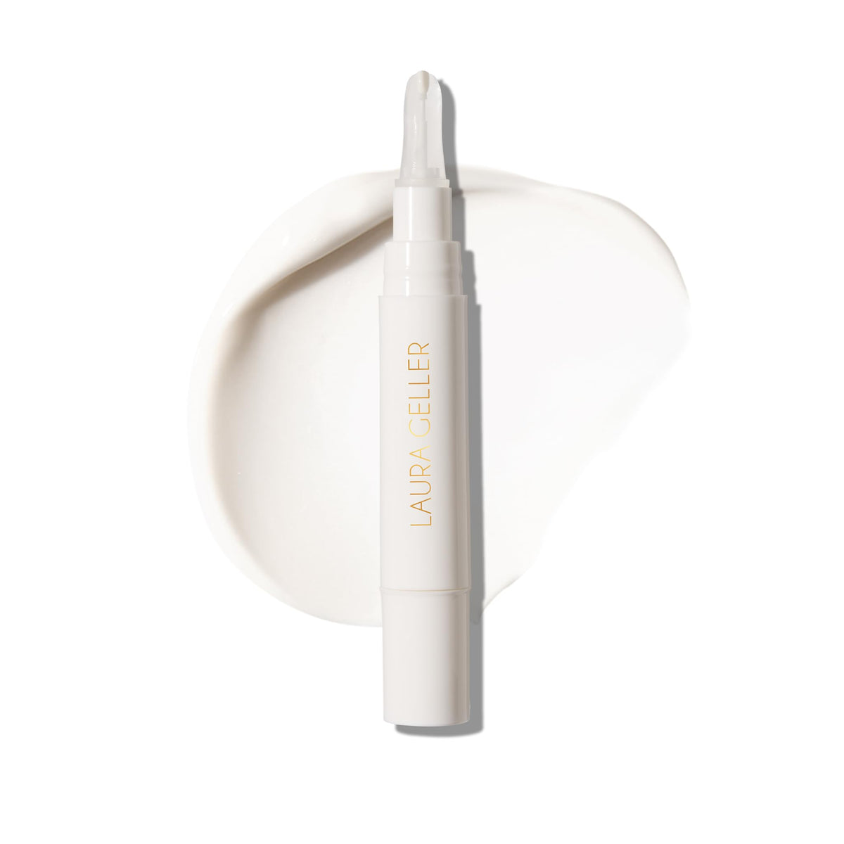 Envase de LAURA GELLER NEW YORK Spackle iluminador listo para primer uso diario.