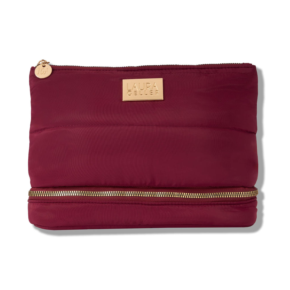 Laura Geller New York sac maquillage matelassé bourgogne, extérieur chic et résistant.