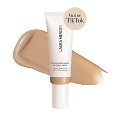 Laura Mercier textura ligera y acabado luminoso para looks naturales.