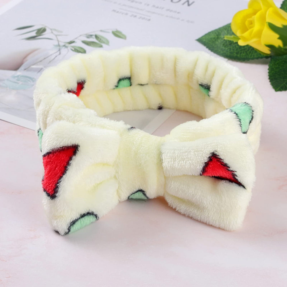 Diadema LAXIZAR lazo verde con estampado para ducha relajante.