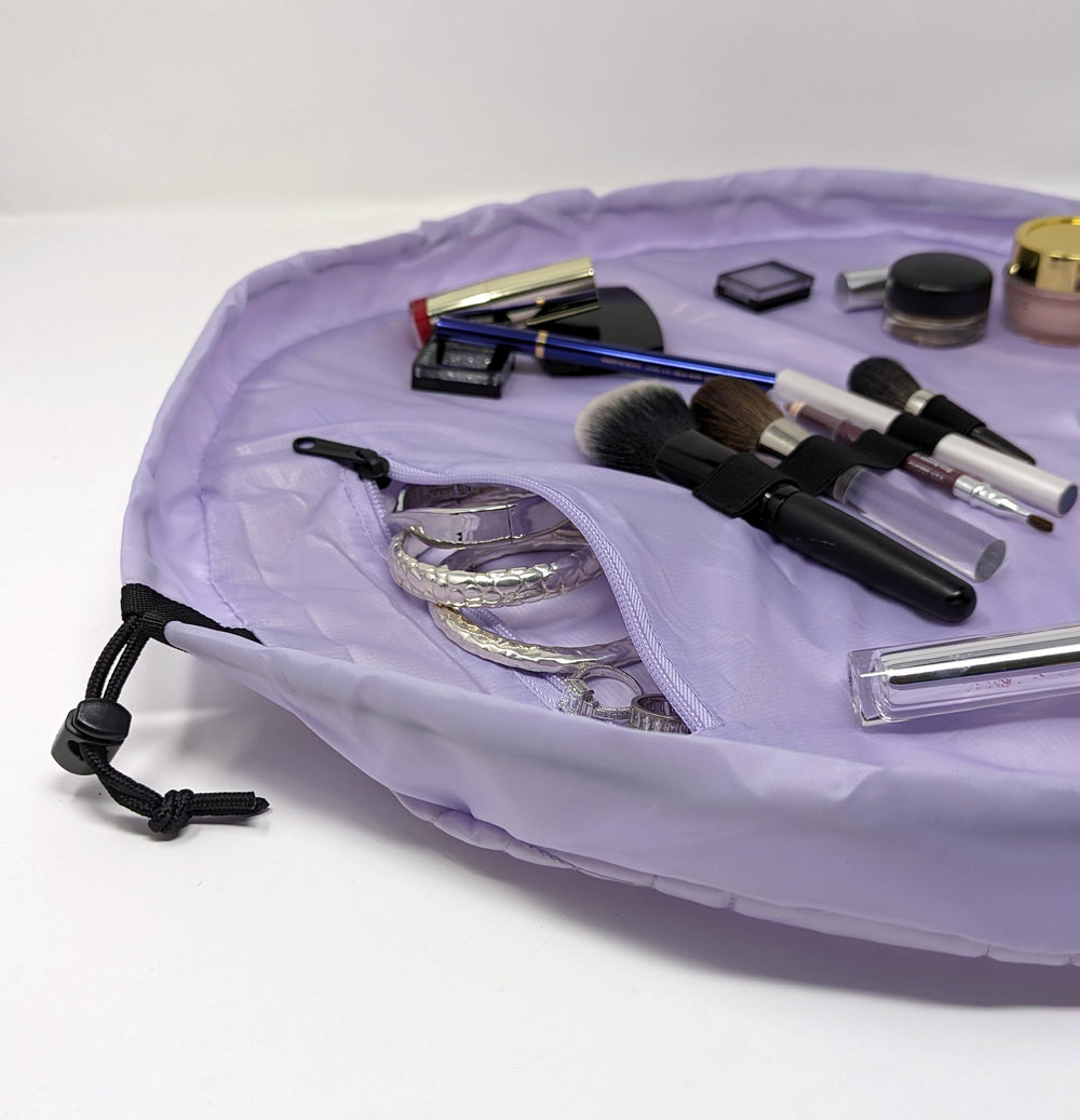 Lay-n-Go Cosmo bolsillo con cremallera interno para guardar artículos pequeños.