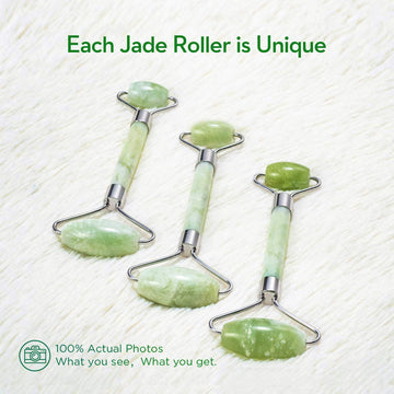 LDREAMAM kimkoo rodillo de jade en manos para masaje facial suave.