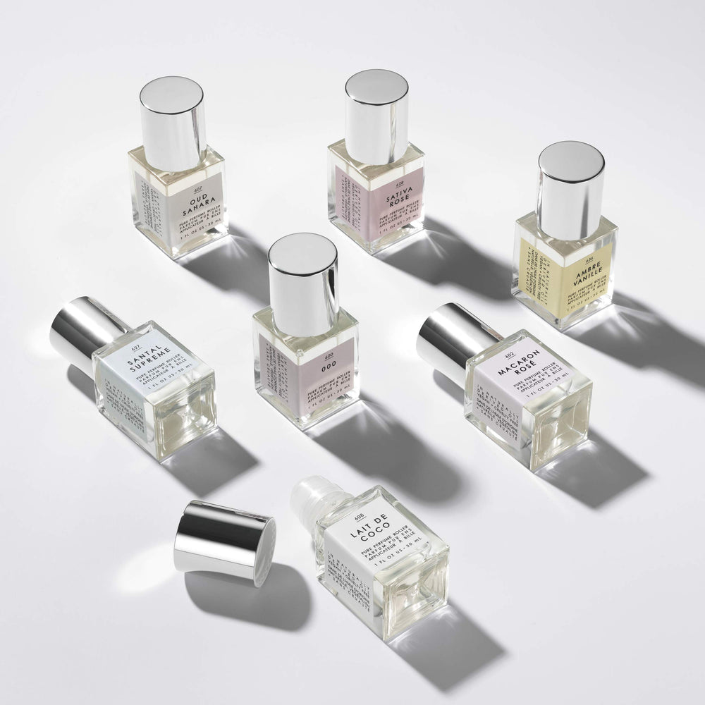 Le Monde Gourmand Santal Supreme bottle close-up for elegant layering.