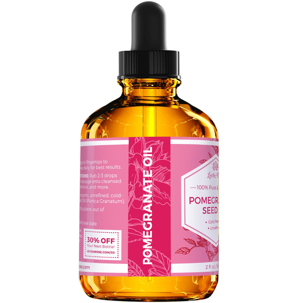Leven Rose Pomegranate Oil on scalp suggesting nourishment for irritated areas