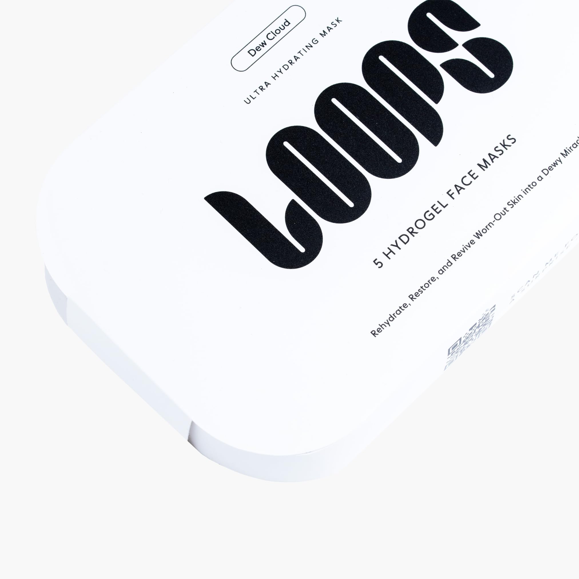 Emballage recyclable et masque découpé en deux pour tous les visages.
