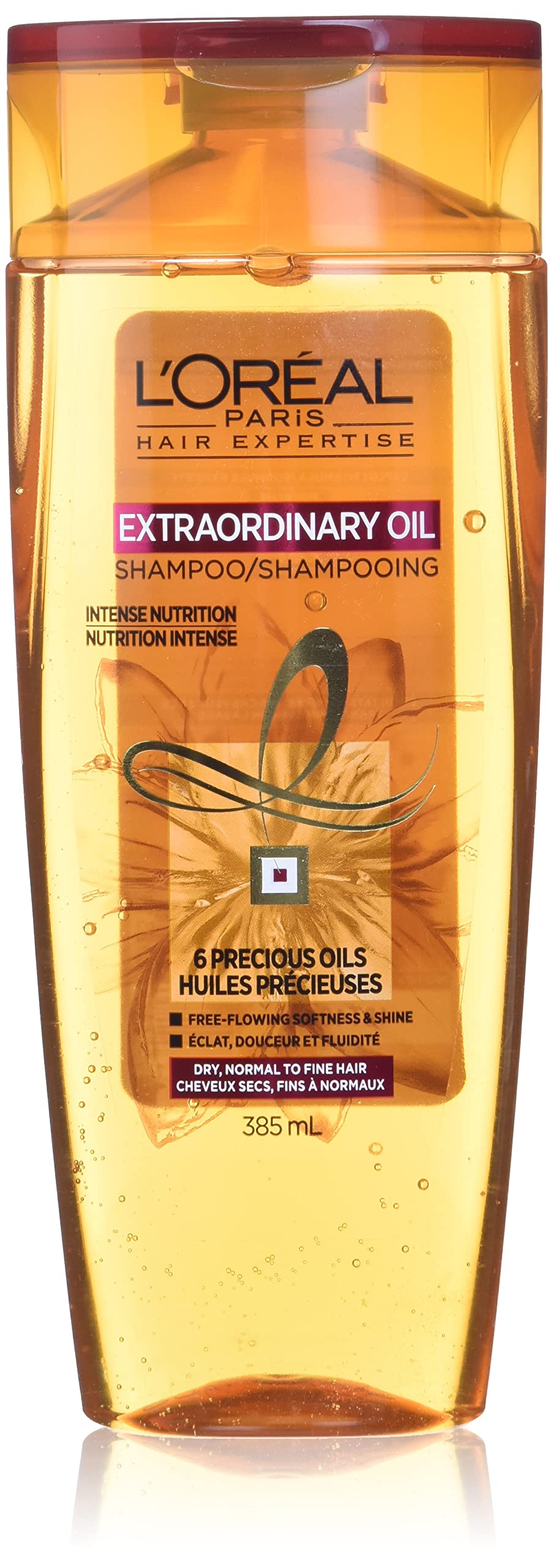 Champú Extraordinario de L’Oréal Paris con aceite ligero en botella para cabello seco.