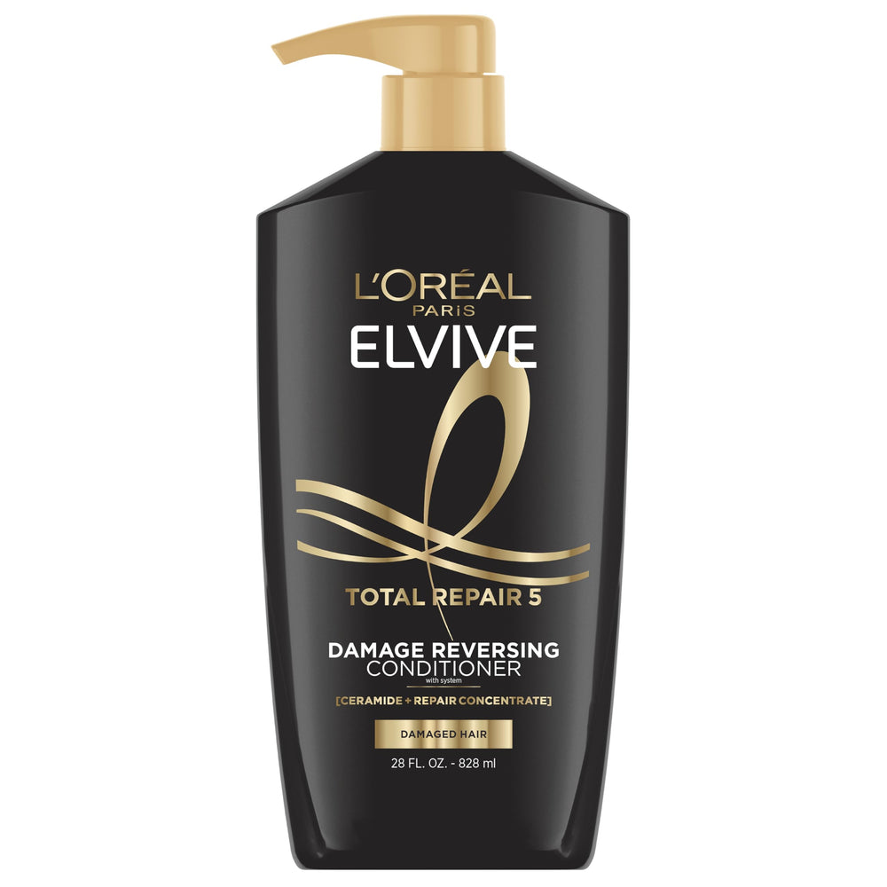 L'Oreal Paris Elvive Total Repair botella con textura cremosa para cabello dañado.