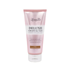 Loving Tan Deluxe Gradual Tan Lotion: bouteille visible avec teinte instantanée pour un résultat précis.