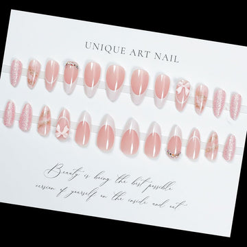 Uñas LPOODDNU con lazo 3D y diamantes para un look elegante.
