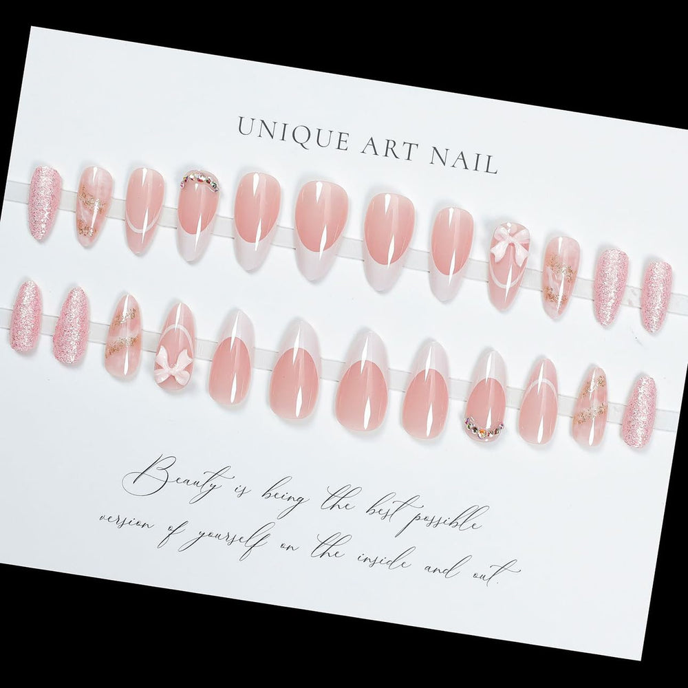 Uñas LPOODDNU con lazo 3D y diamantes para un look elegante.
