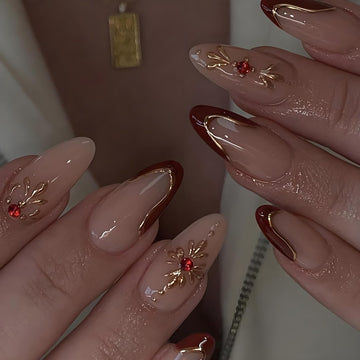 Uñas LPOODDNU adheribles en forma almendra con diseño 3D dorado y diamantes.