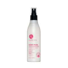 Luseta Perla Brillante sin enjuague, envase visible, aporta hidratación profunda al cabello.