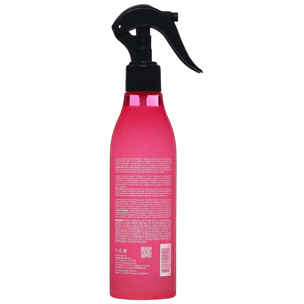 Even distribution of Luseta Keratin Heat Protectant mist on towel-dried hair.