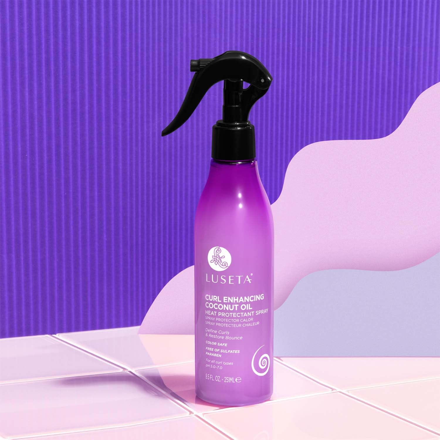 Luseta thermal protection spray mist showing even distribution before heat styling.